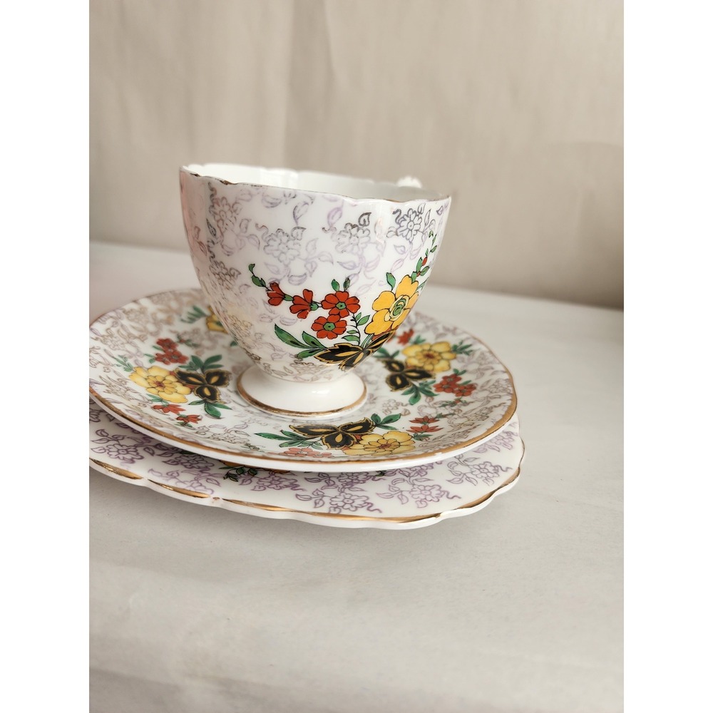 Shelley Fine Bone China teacup with matching-style saucer and plate"